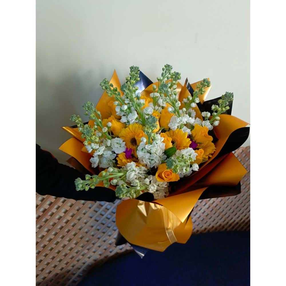 Bouquet of Yellow Roses, Solidago, and Gerbera.