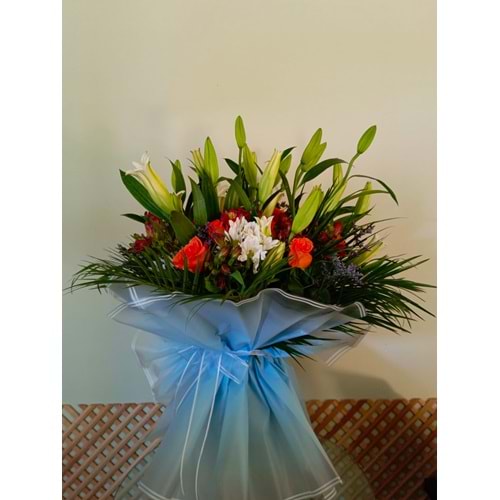 Bouquet of Lily, Gerbera, and Rose with Fresh Greens.