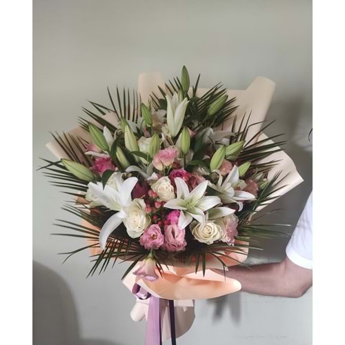 Bouquet of Lily, Rose, and Lisianthus with Fresh Greens.