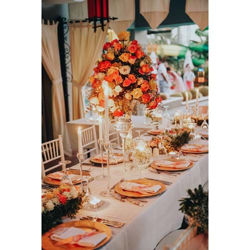Round Table Decoration with Mixed Colored Roses in a Tall Glass Vase